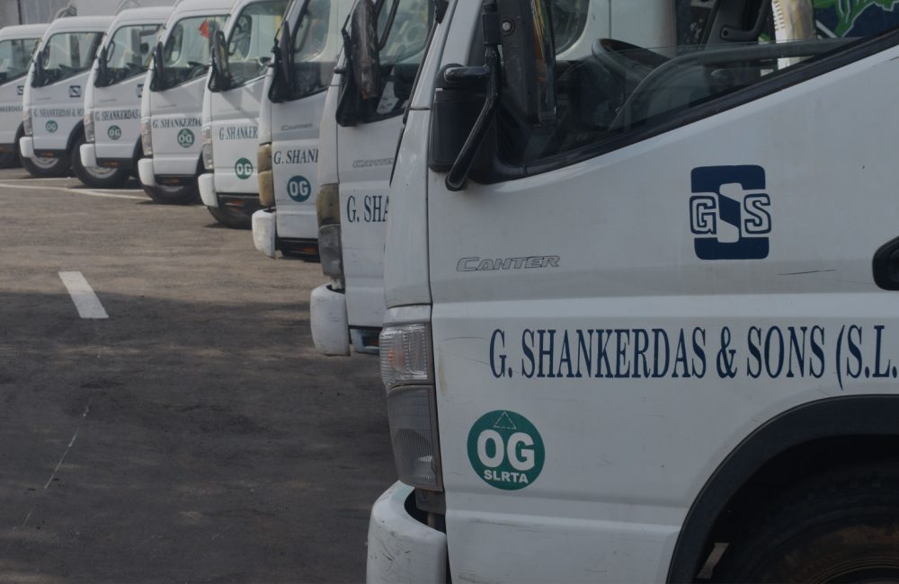 A line of white truck cabs