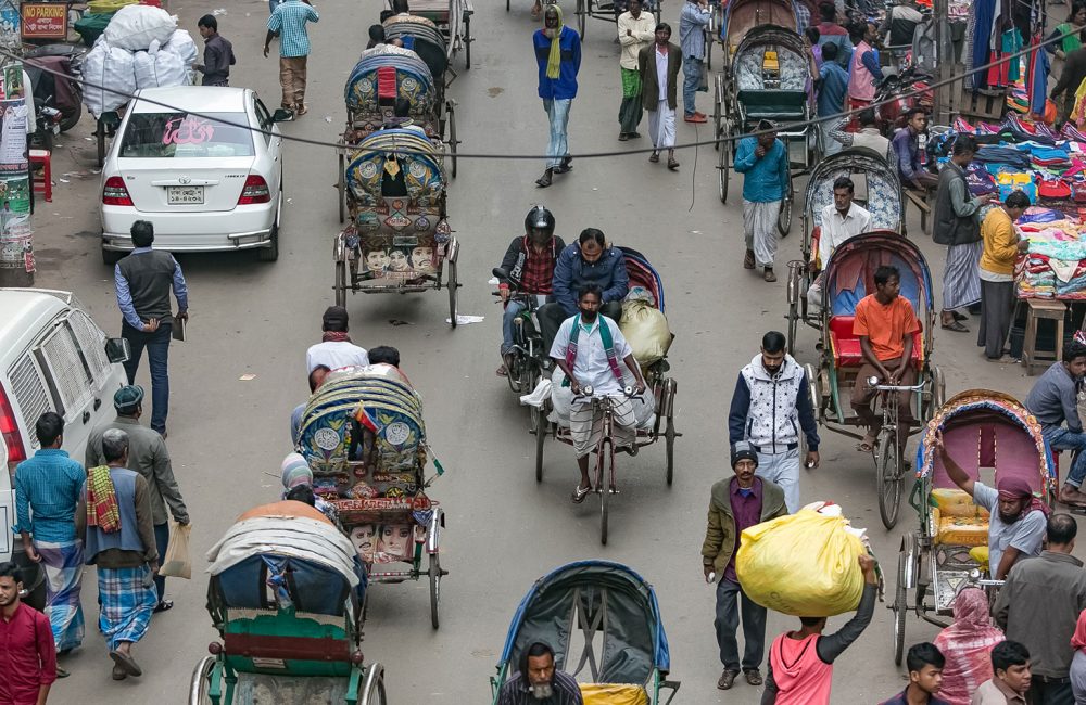 People moving around a street