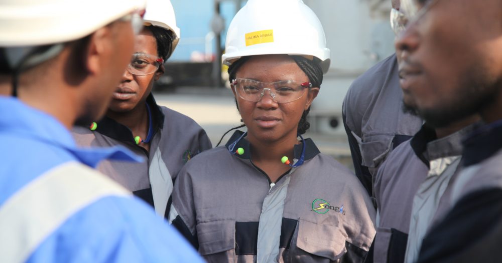 Young female worker part of a gender diverse team